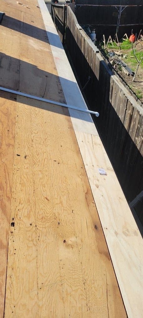 New plywood roof decking installed after removing rotted wood