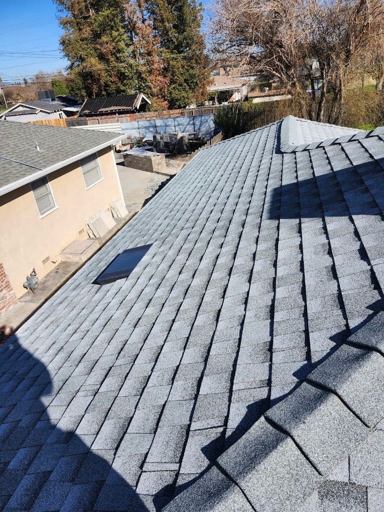 New shingle roof with a skylight