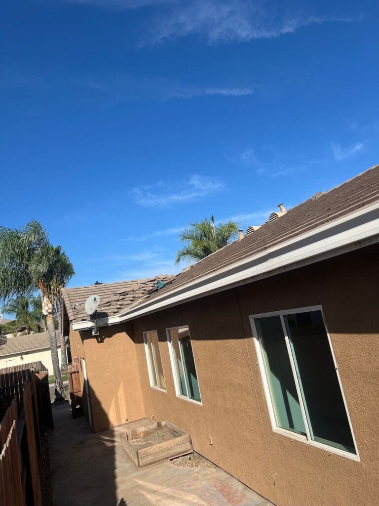 Clean tile roof edge after valley cleaning